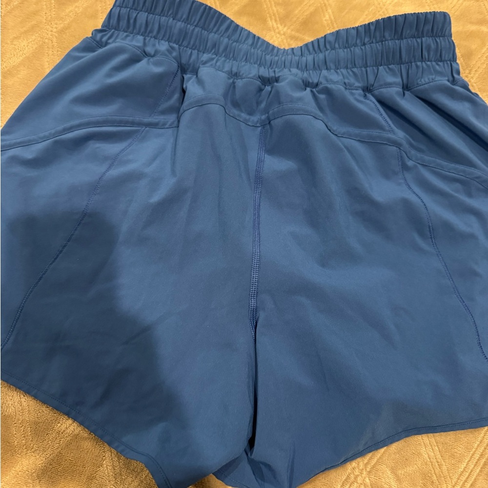 Women's Blue Athletic Lululemon 5 inch lined track short.